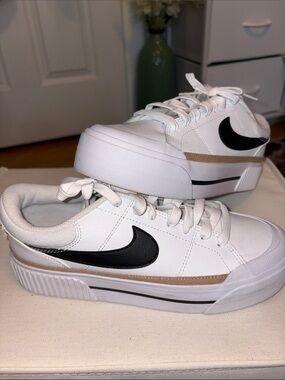 Nike women’s court legacy White Low-Top Sneakers with Black Swoosh Accent
